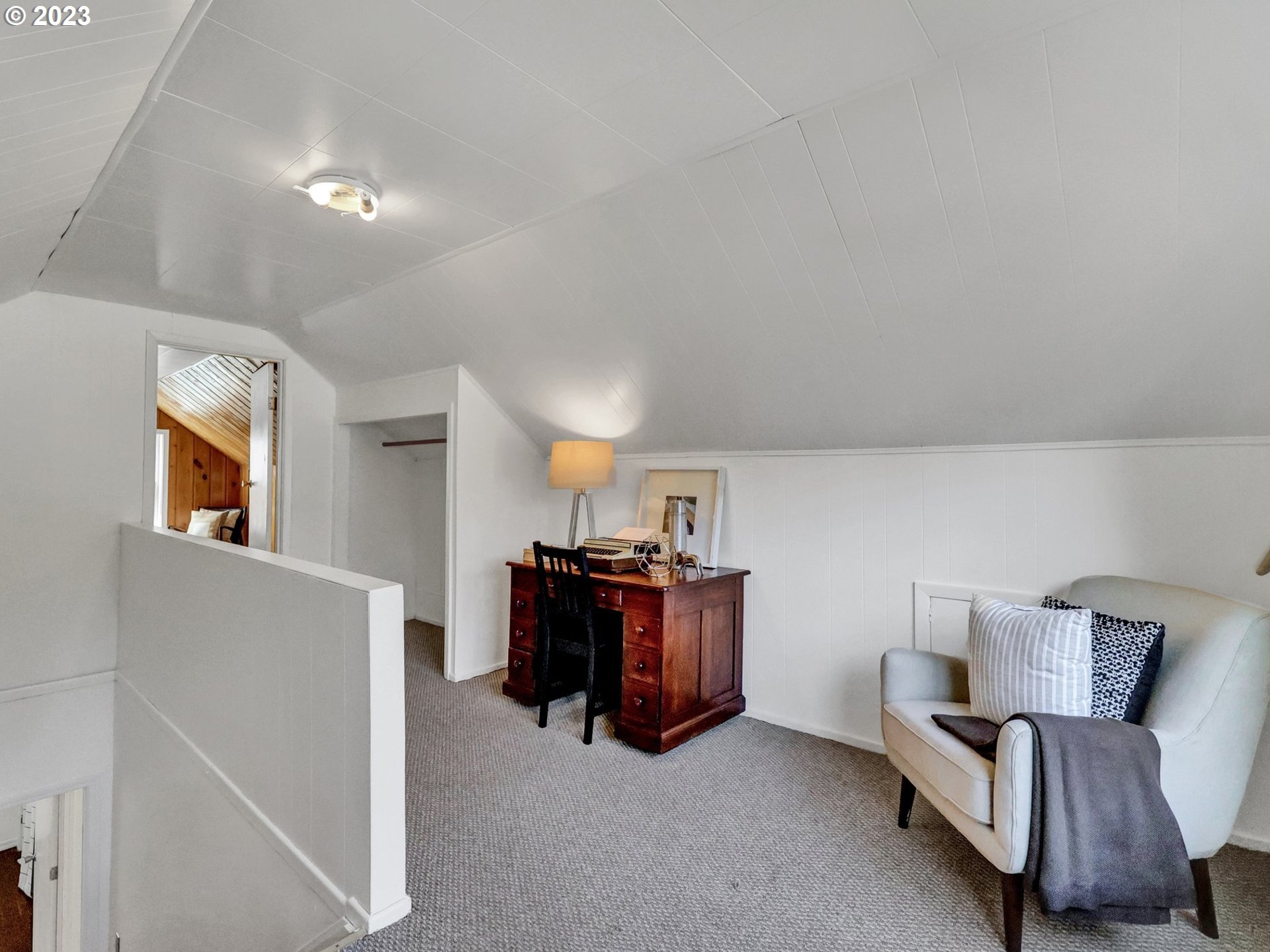 5606 Northeast 27th Avenue Portland, OR 97211 - Photo 21 of 48 a living room with furniture and kitchen view