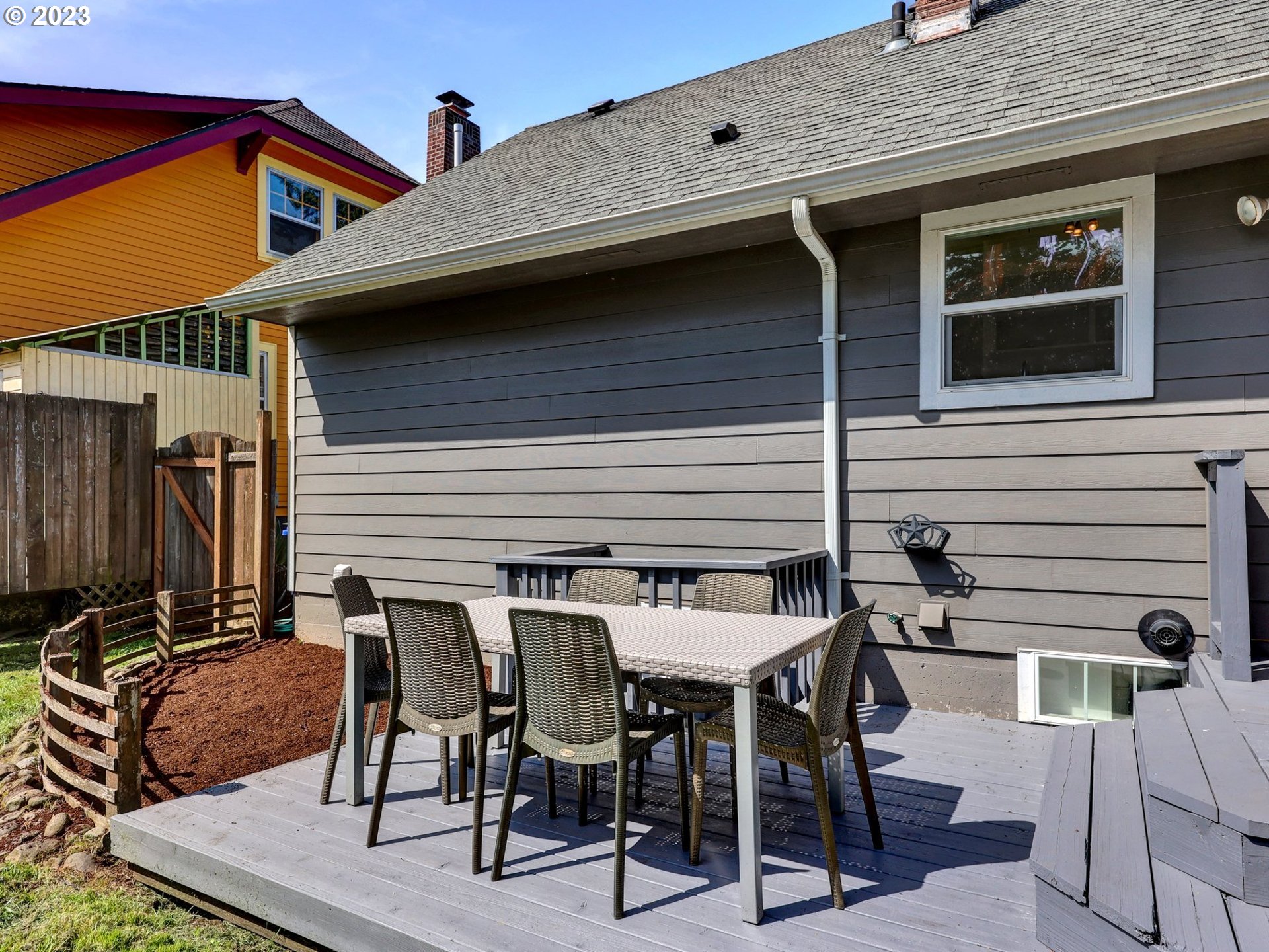 5606 Northeast 27th Avenue Portland, OR 97211 - Photo 28 of 48 a view of a dinning table and chairs in the patio