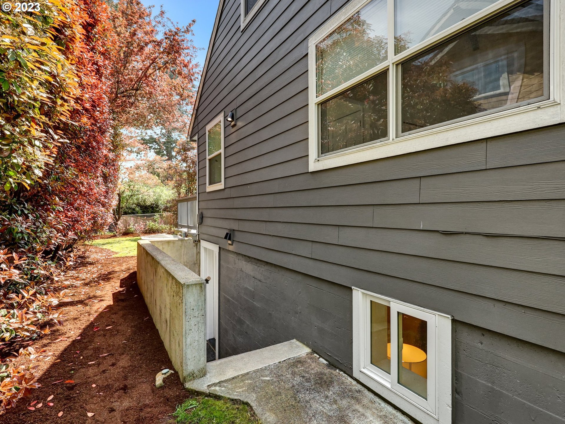 5606 Northeast 27th Avenue Portland, OR 97211 - Photo 32 of 48 a view of a house with a backyard