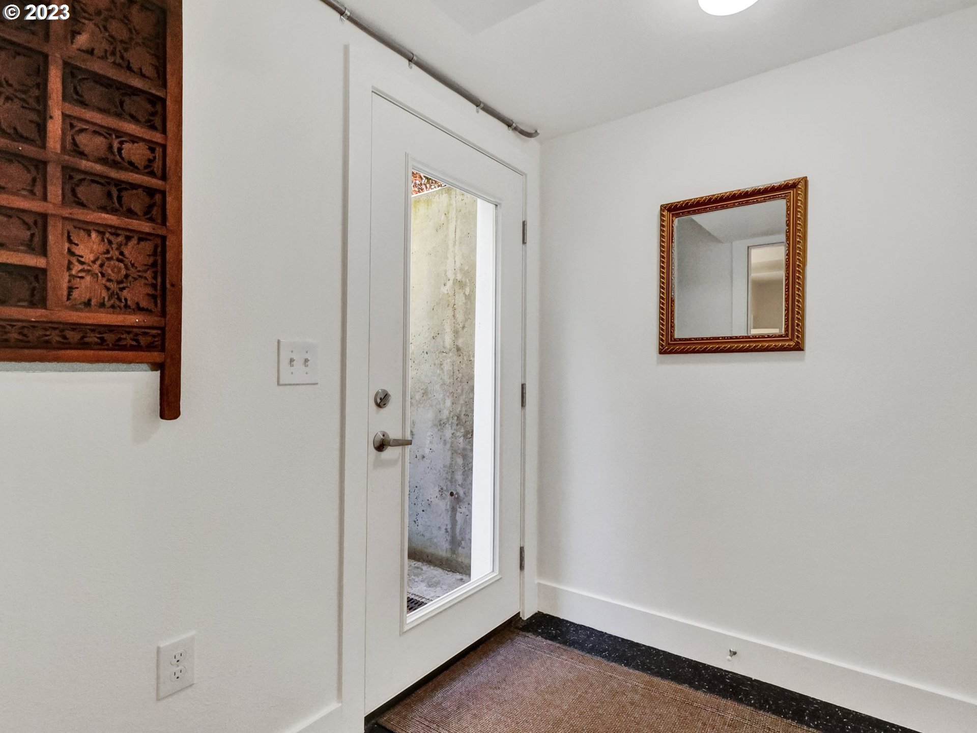 5606 Northeast 27th Avenue Portland, OR 97211 - Photo 33 of 48 a view of a hallway with closet
