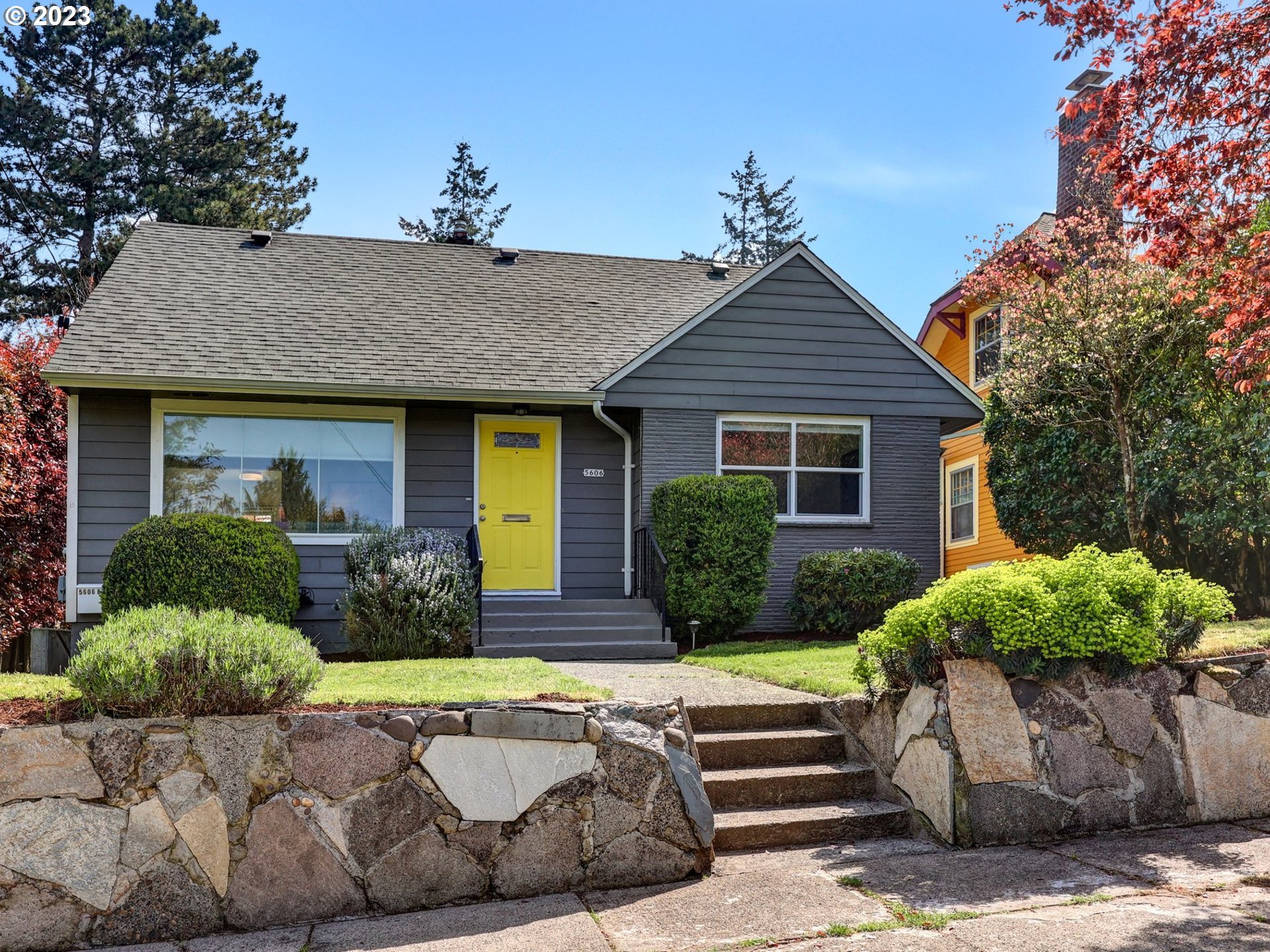 5606 Northeast 27th Avenue Portland, OR 97211 - Photo 48 of 48 a front view of a house with garden