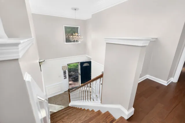 a view of entryway with wooden floor