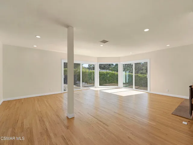 a view of kitchen with wooden floor