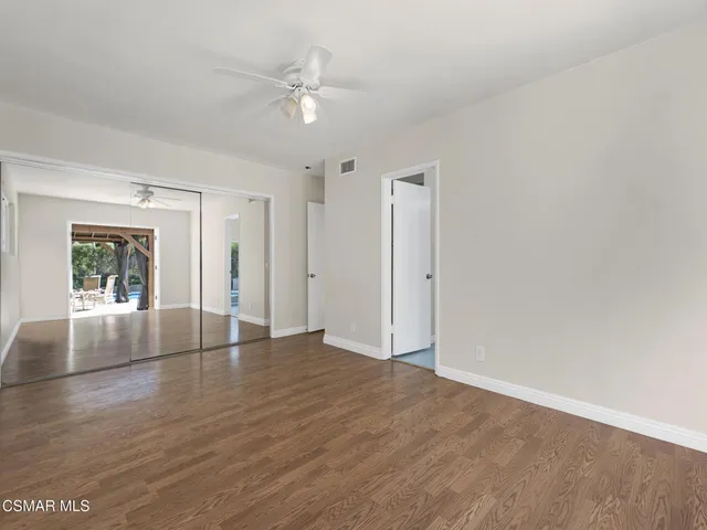 a bathroom with a tub a sink and shower
