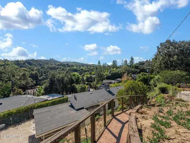 a view of a garden with a patio