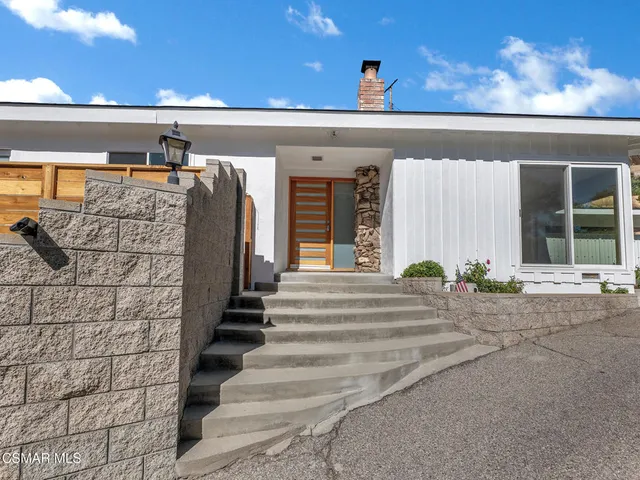 a view of outdoor space yard deck patio and fire pit