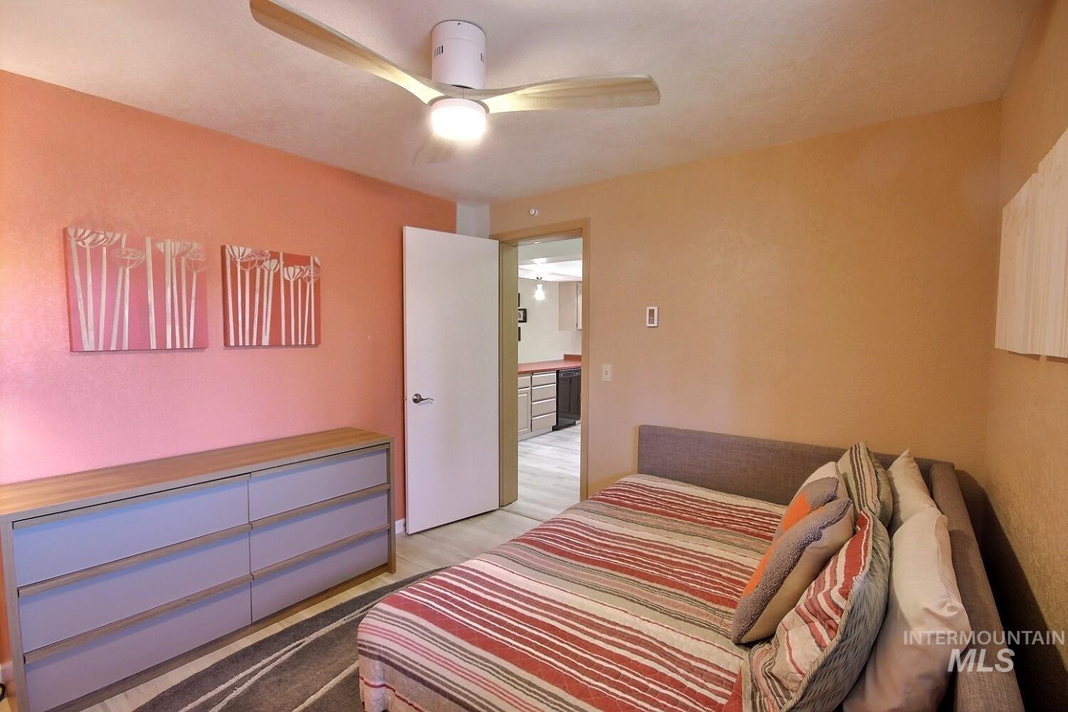 1640 Davis Avenue, Unit 7 McCall, ID 83638 - Photo 9 of 21 Bedroom featuring a ceiling fan