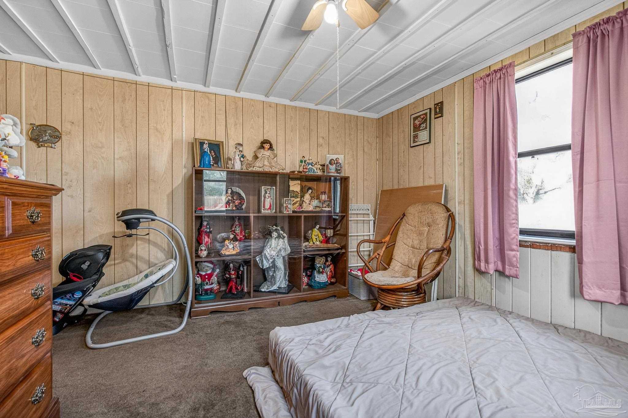 1450 East Burgess Road Pensacola, FL 32504 - Photo 11 of 49 a view of a room with gym equipment