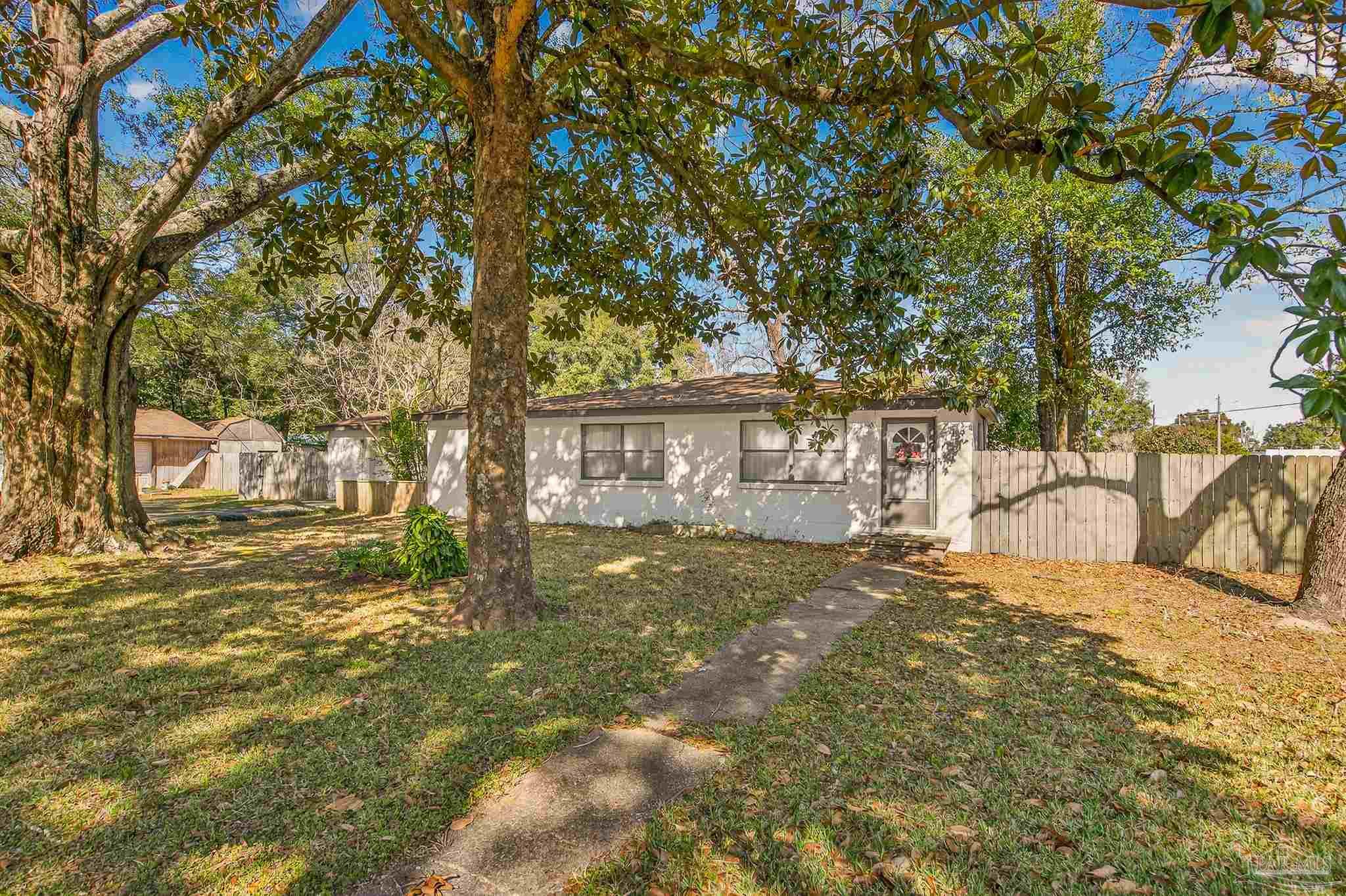 1450 East Burgess Road Pensacola, FL 32504 - Photo 3 of 49 a view of yard with trees