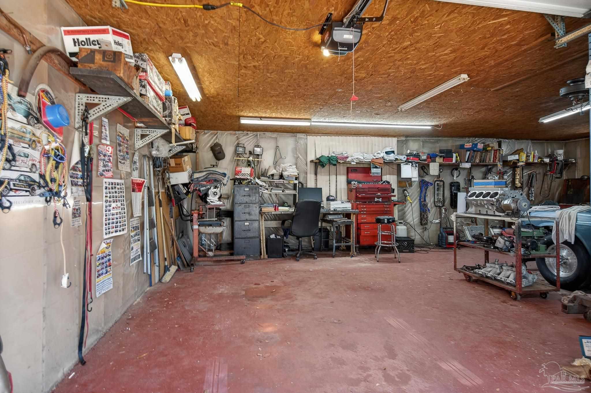 1450 East Burgess Road Pensacola, FL 32504 - Photo 49 of 49 a view of a room with gym equipment