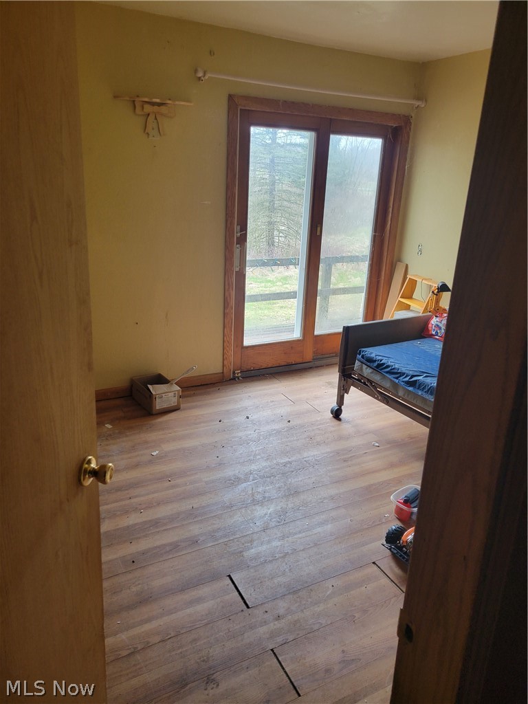 13989 Diagonal Road Salem, OH 44460 - Photo 13 of 18 Bedroom with light wood-type flooring