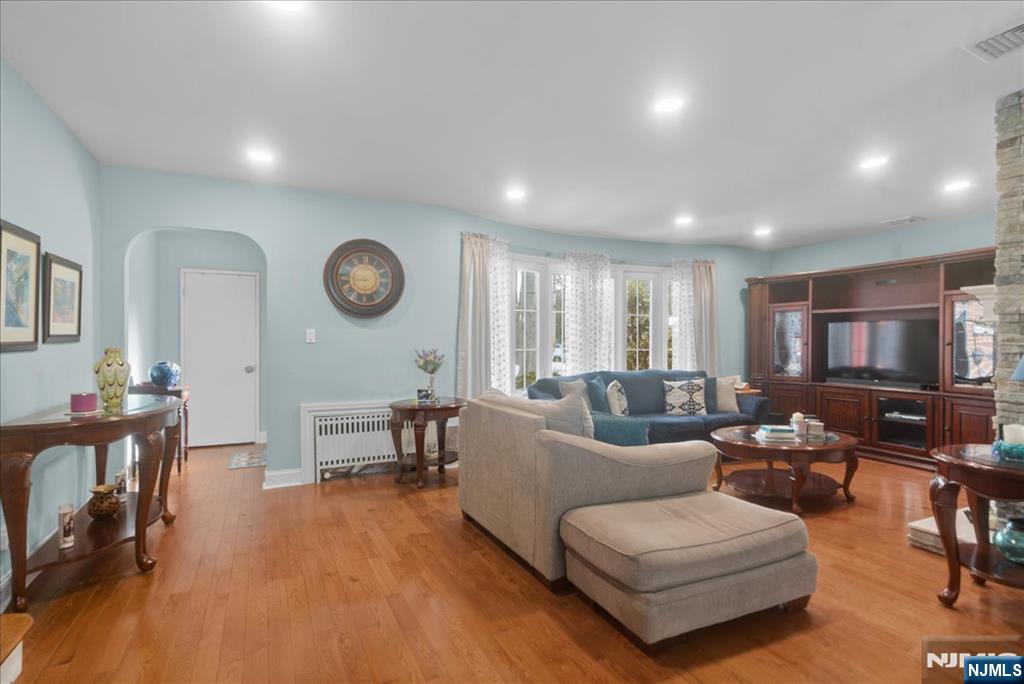 149 Allen Street Hackensack, NJ 07601 - Photo 9 of 39 a living room with furniture window and wooden floor