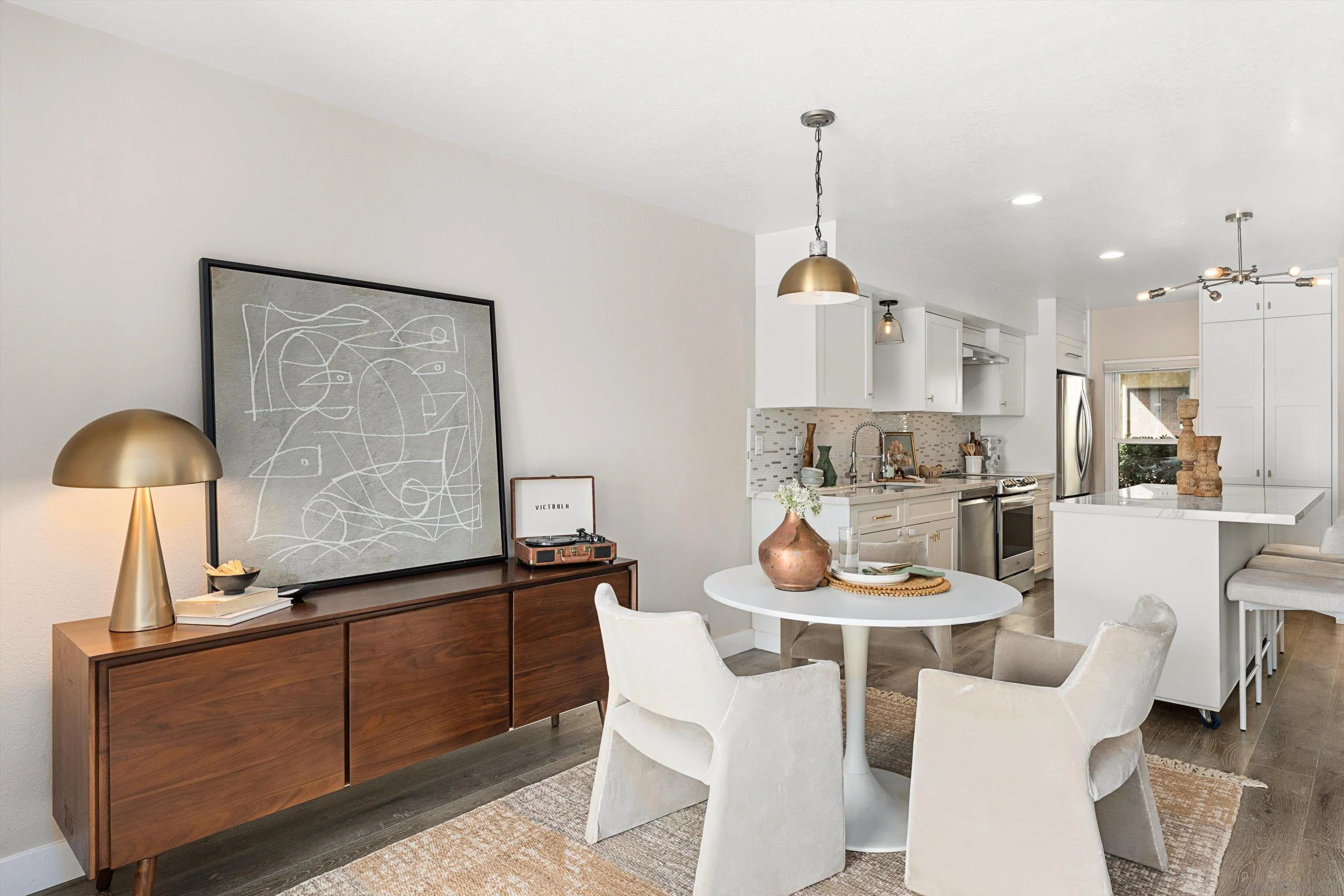 1913 Alga Road, Unit A Carlsbad, CA 92009 - Photo 12 of 44 a dining room with furniture and window
