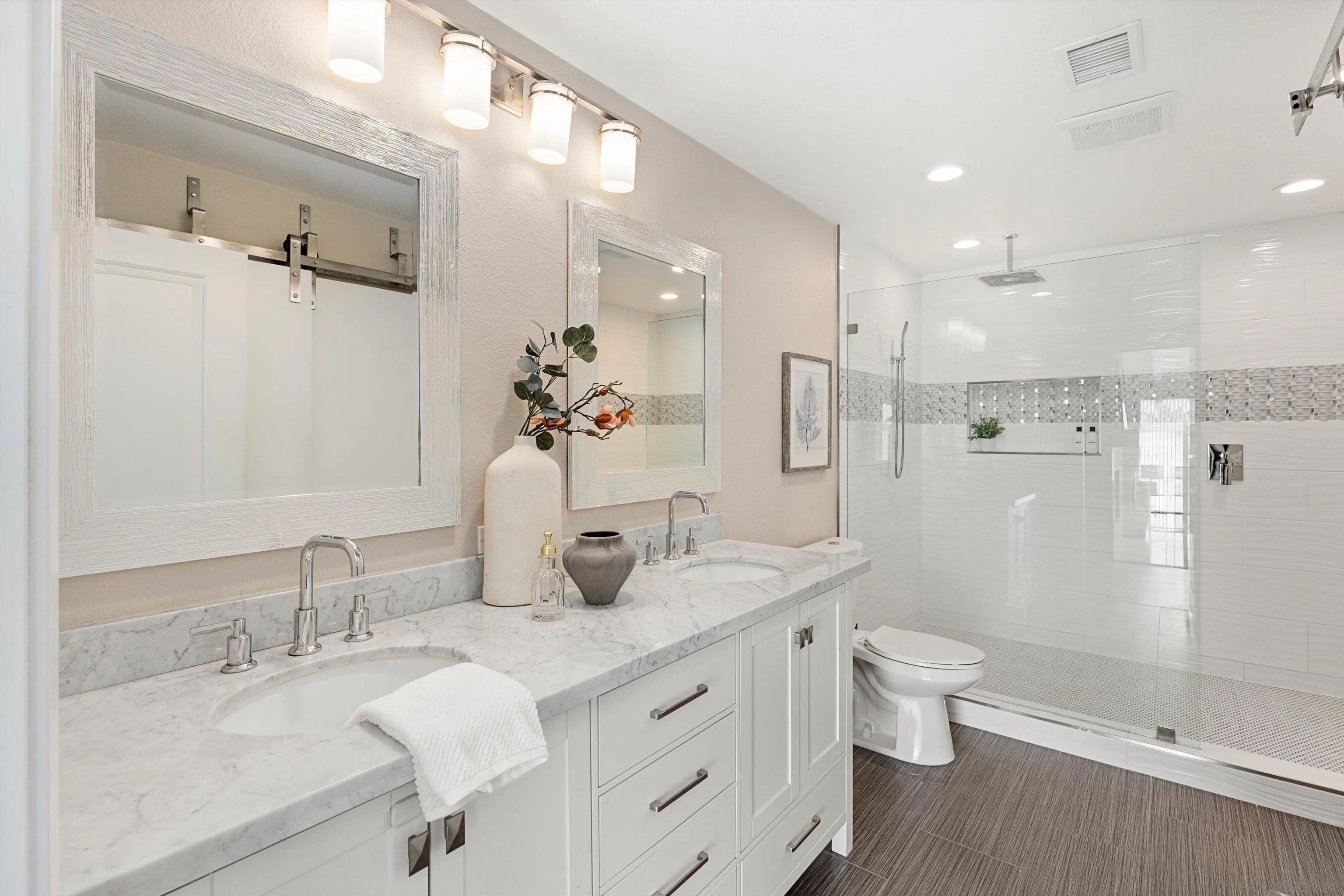 1913 Alga Road, Unit A Carlsbad, CA 92009 - Photo 24 of 44 a bathroom with a granite countertop sink a toilet a shower and a mirror