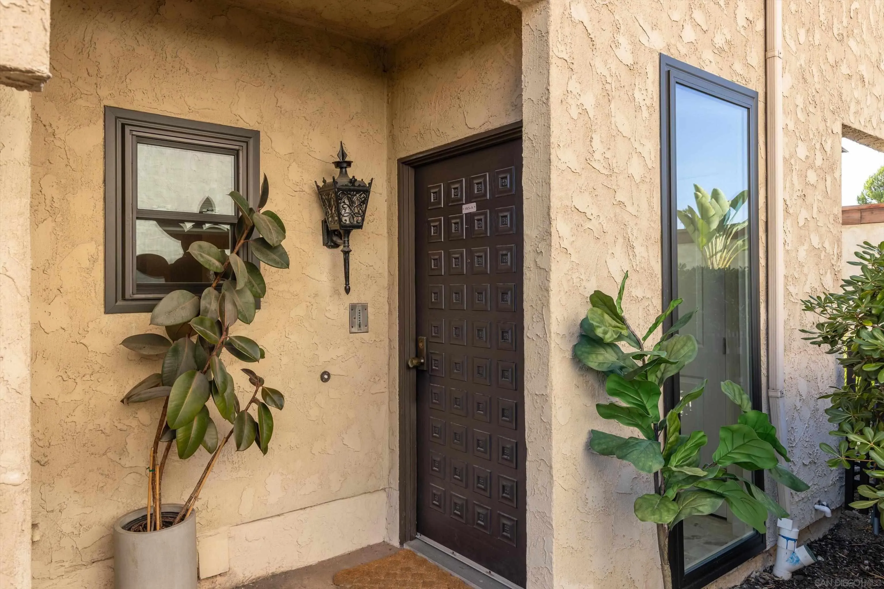 1913 Alga Road, Unit A Carlsbad, CA 92009 - Photo 33 of 44 a view of a entryway