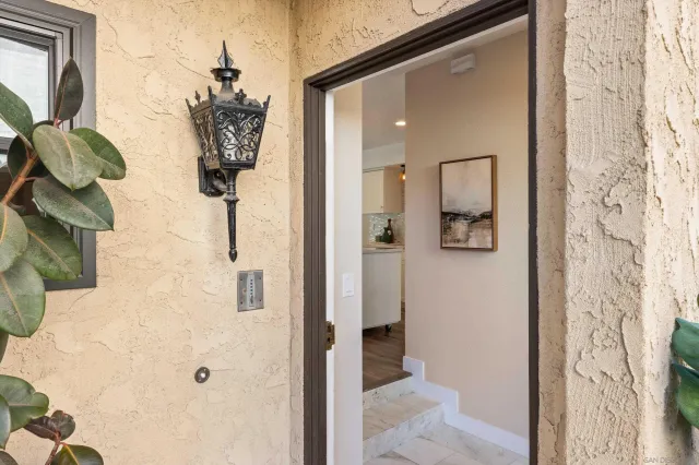a bathroom with a double vanity sink and shower
