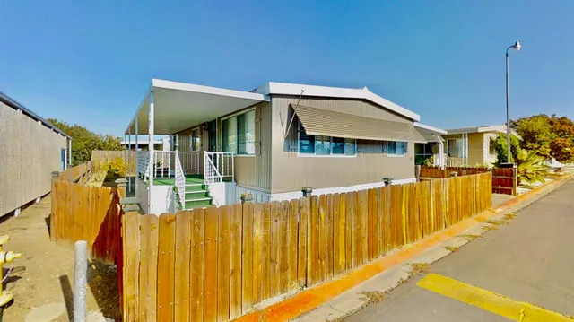 a view of an house with a swimming pool