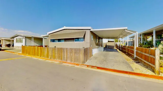 a view of a kitchen cabinets and wooden floor