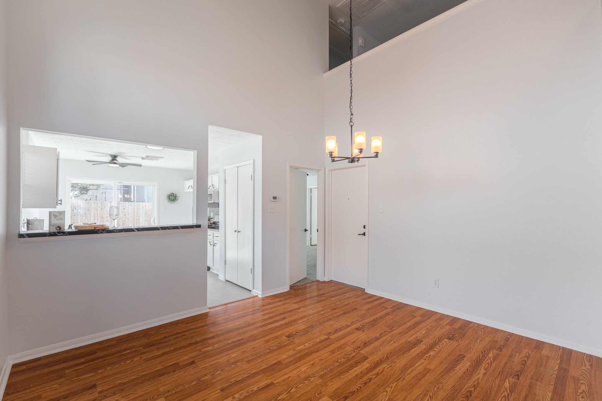 10347 Mist Lane Houston, TX 77070 - Photo 8 of 32 a view of empty room with wooden floor