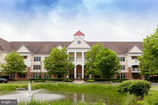 front view of a house with a swimming pool