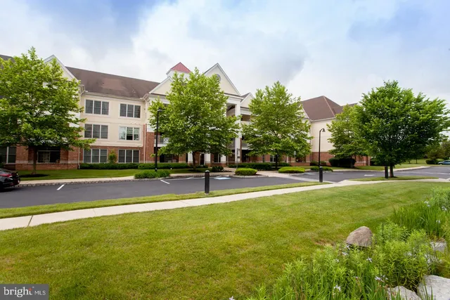 a view of a house with a big yard