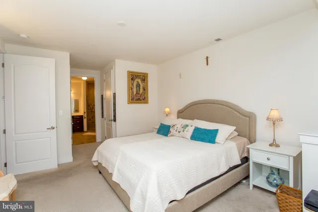 a bathroom with a sink double vanity and a shower