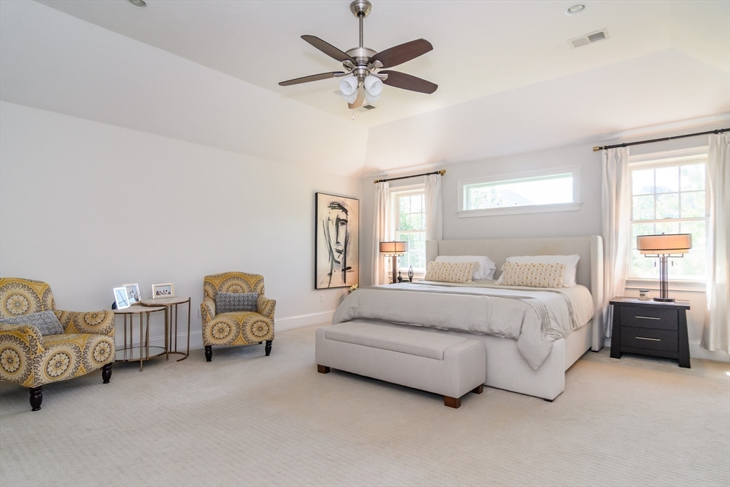 2 Hunters Lane Natick, MA 01760 - Photo 17 of 40 a spacious bedroom with a bed and window