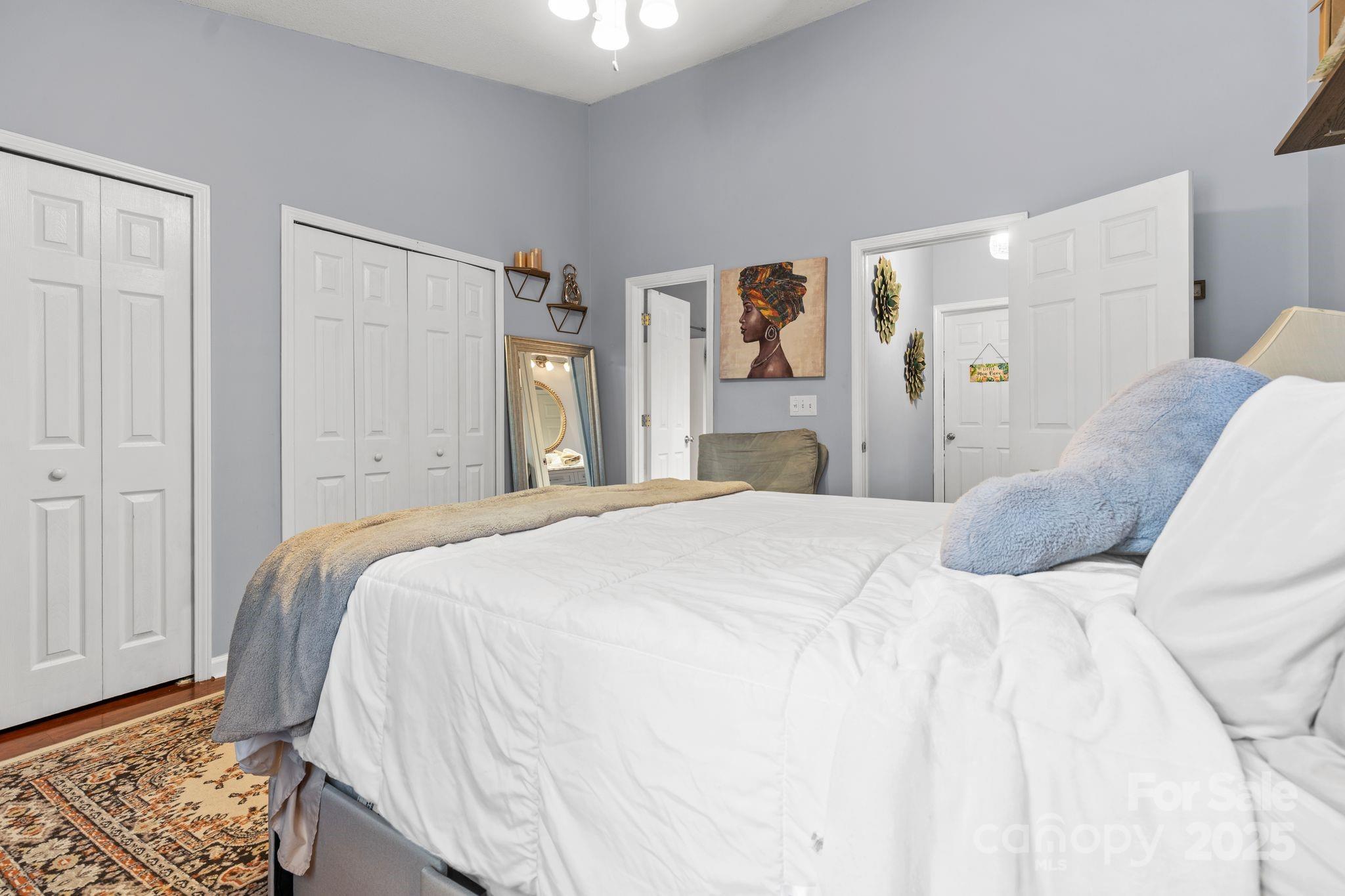 11643 Retriever Way Charlotte, NC 28269 - Photo 14 of 21 a bedroom with a bed and a window