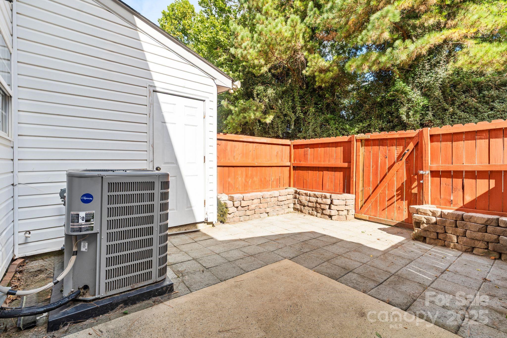11643 Retriever Way Charlotte, NC 28269 - Photo 19 of 21 a view of a backyard with a house and stairs