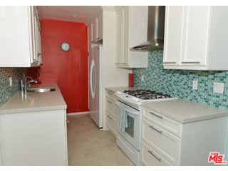 4066 Alla Road Los Angeles, CA 90066 - Photo 2 of 11 a kitchen with a sink stove and cabinets