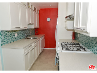 4066 Alla Road Los Angeles, CA 90066 - Photo 3 of 11 a kitchen that has a sink and a stove