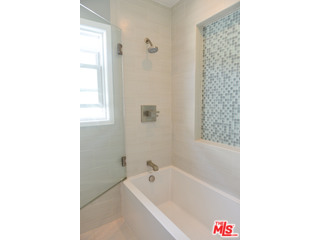 4066 Alla Road Los Angeles, CA 90066 - Photo 8 of 11 a bathroom with a bathtub and a shower