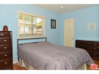 4066 Alla Road Los Angeles, CA 90066 - Photo 9 of 11 a bedroom with a bed and a dresser