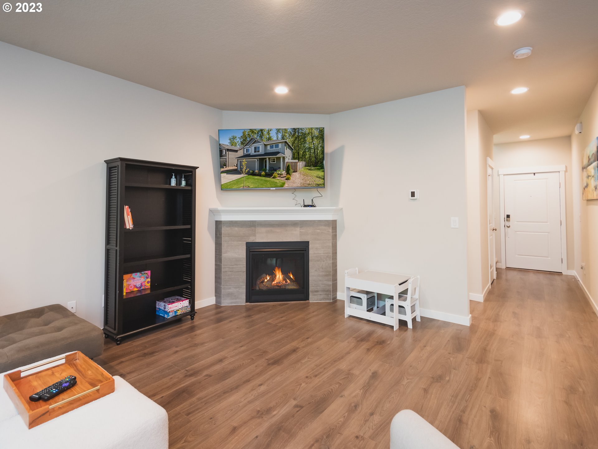 1603 Northeast 170th Circle Ridgefield, WA 98642 - Photo 6 of 23 a living room with furniture and a fireplace