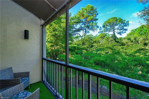 a view of a balcony with an outdoor space