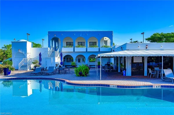 a view of a house with swimming pool