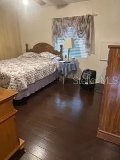 a bathroom with a sink vanity and a mirror