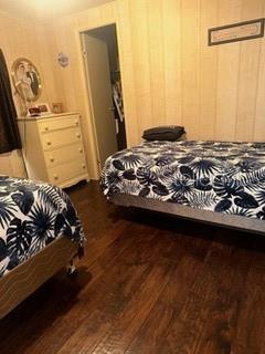 1211 Apache Circle Tavares, FL 32778 - Photo 9 of 9 a bedroom with a bed and dresser