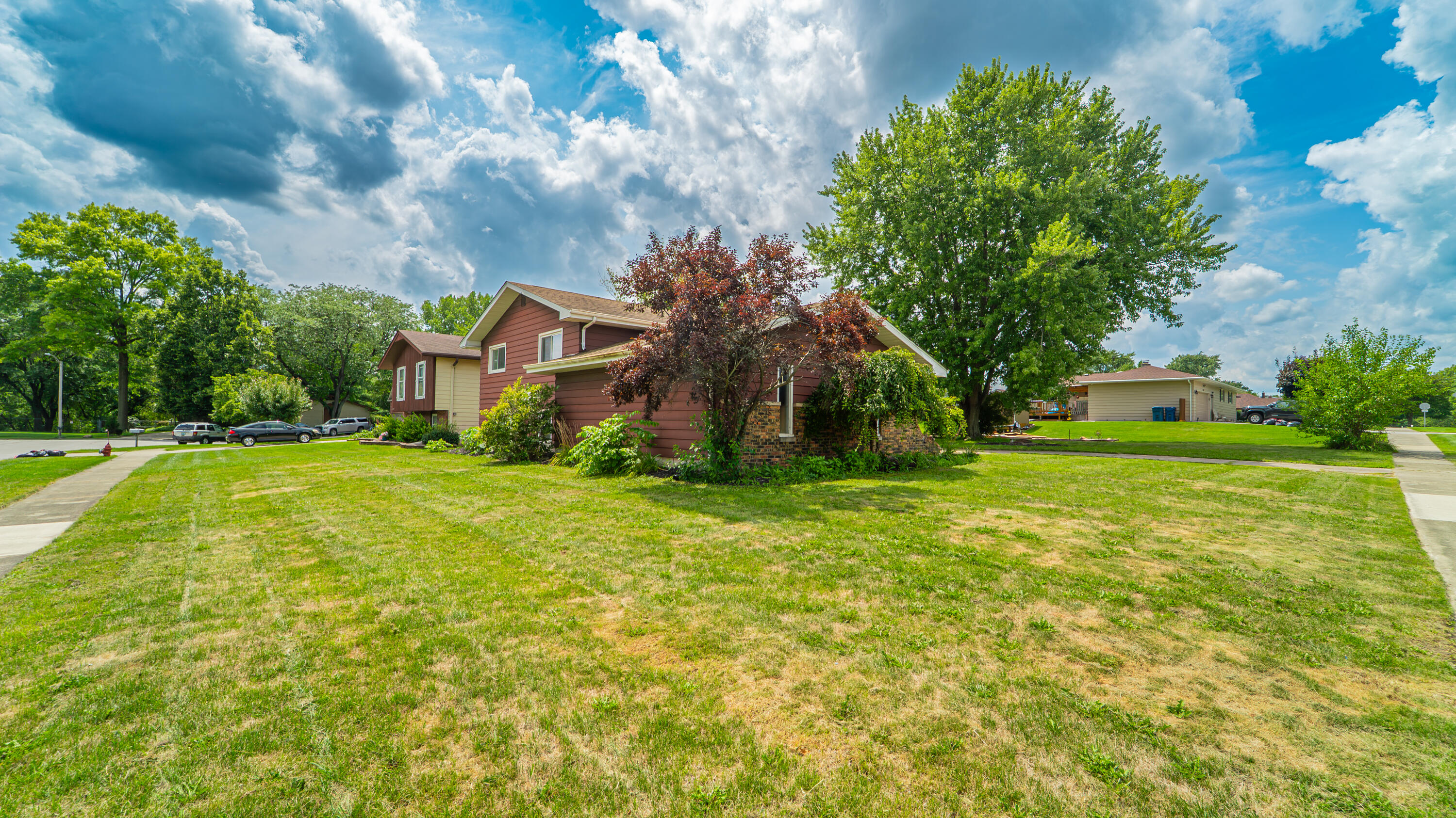 2008 Sir Richard Road Schererville, IN 46375 - Photo 20 of 24 a view of a house with a backyard