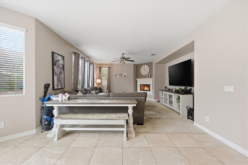 34326 Heather Ridge Road Lake Elsinore, CA 92532 - Photo 15 of 46 a view of living room with furniture and flat screen tv