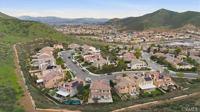 an aerial view of residential house with an outdoor space