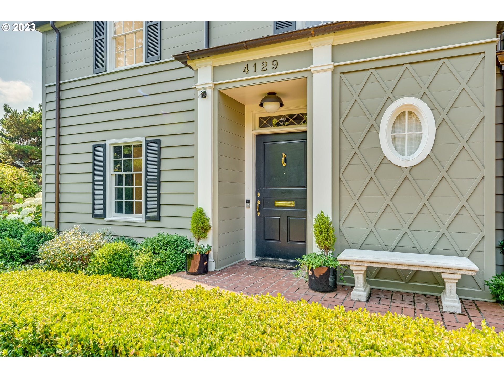 4129 Southwest Greenleaf Court Portland, OR 97221 - Photo 2 of 48 a house view with a outdoor space