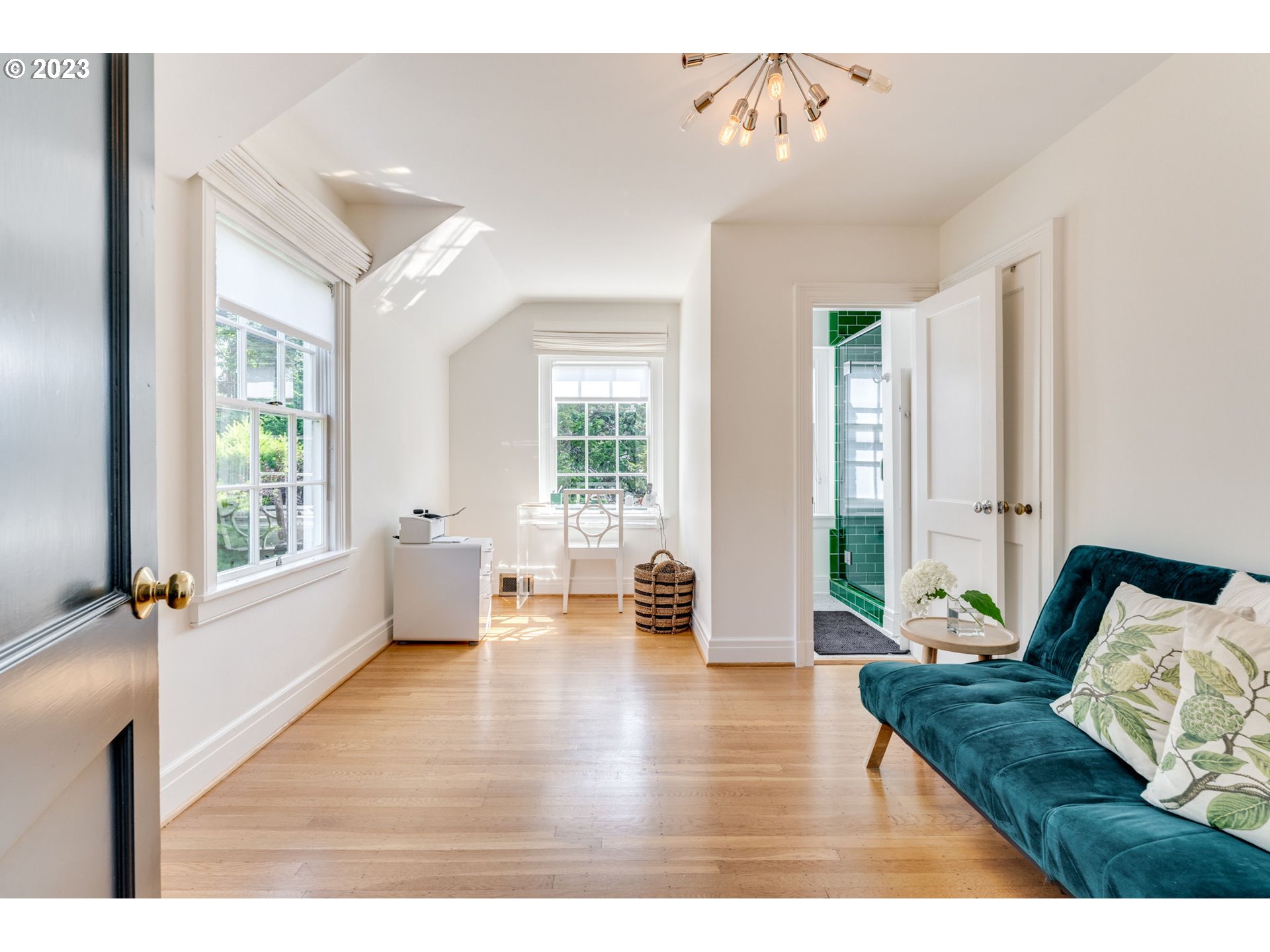 4129 Southwest Greenleaf Court Portland, OR 97221 - Photo 29 of 48 a living room with furniture and wooden floor