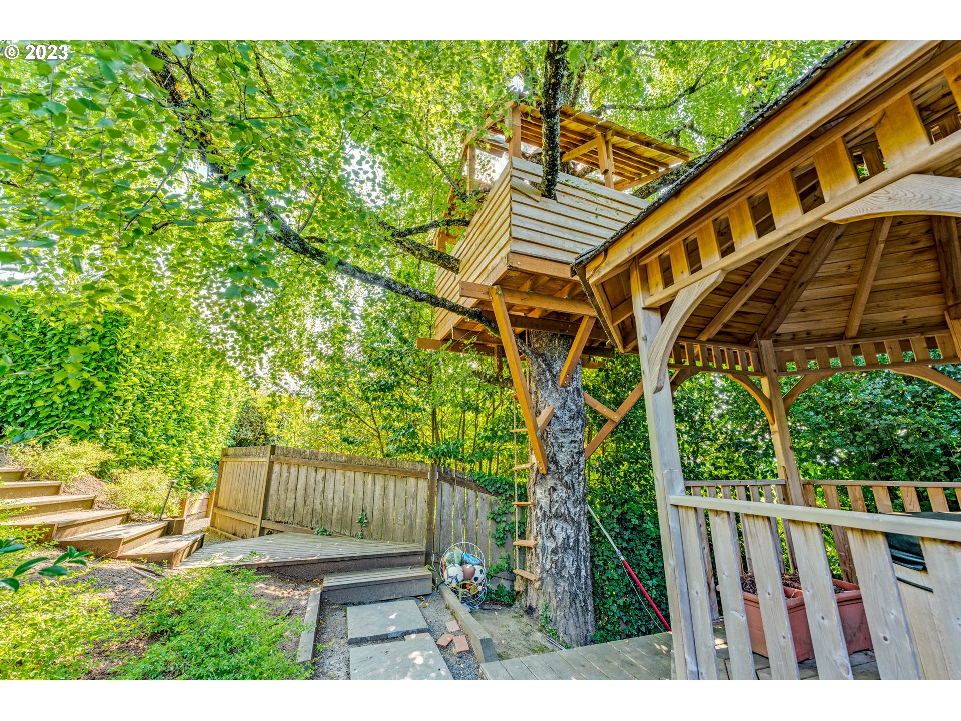 4129 Southwest Greenleaf Court Portland, OR 97221 - Photo 40 of 48 a view of entryway with a yard