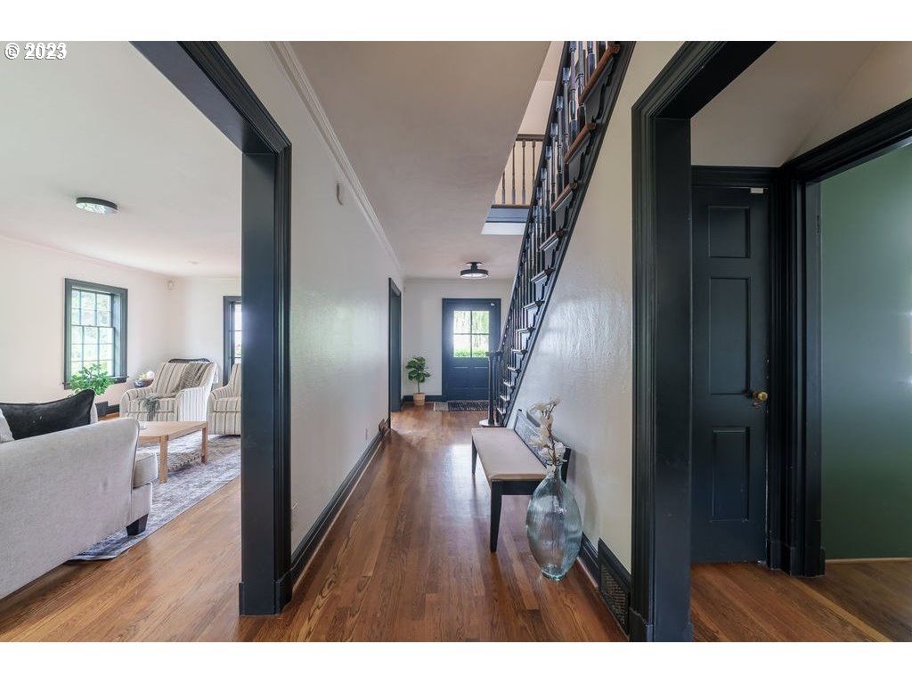 4129 Southwest Greenleaf Court Portland, OR 97221 - Photo 4 of 48 a view of entryway and hall with wooden floor