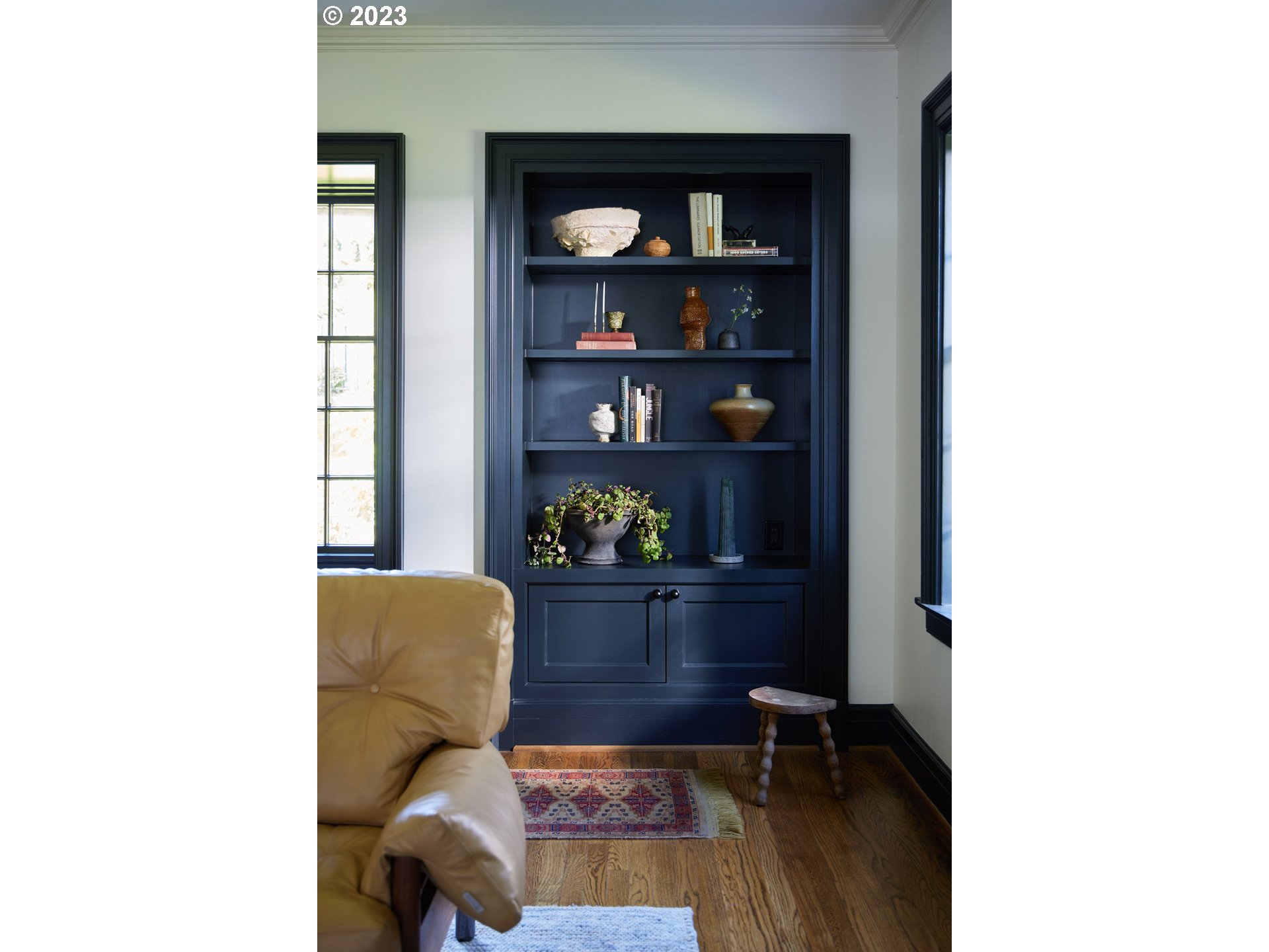 4129 Southwest Greenleaf Court Portland, OR 97221 - Photo 8 of 48 a living room with furniture and a rug
