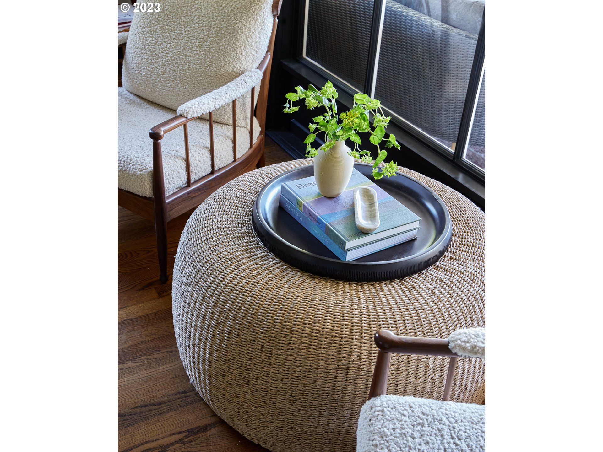4129 Southwest Greenleaf Court Portland, OR 97221 - Photo 10 of 48 a vase of flowers sitting on a table and chair