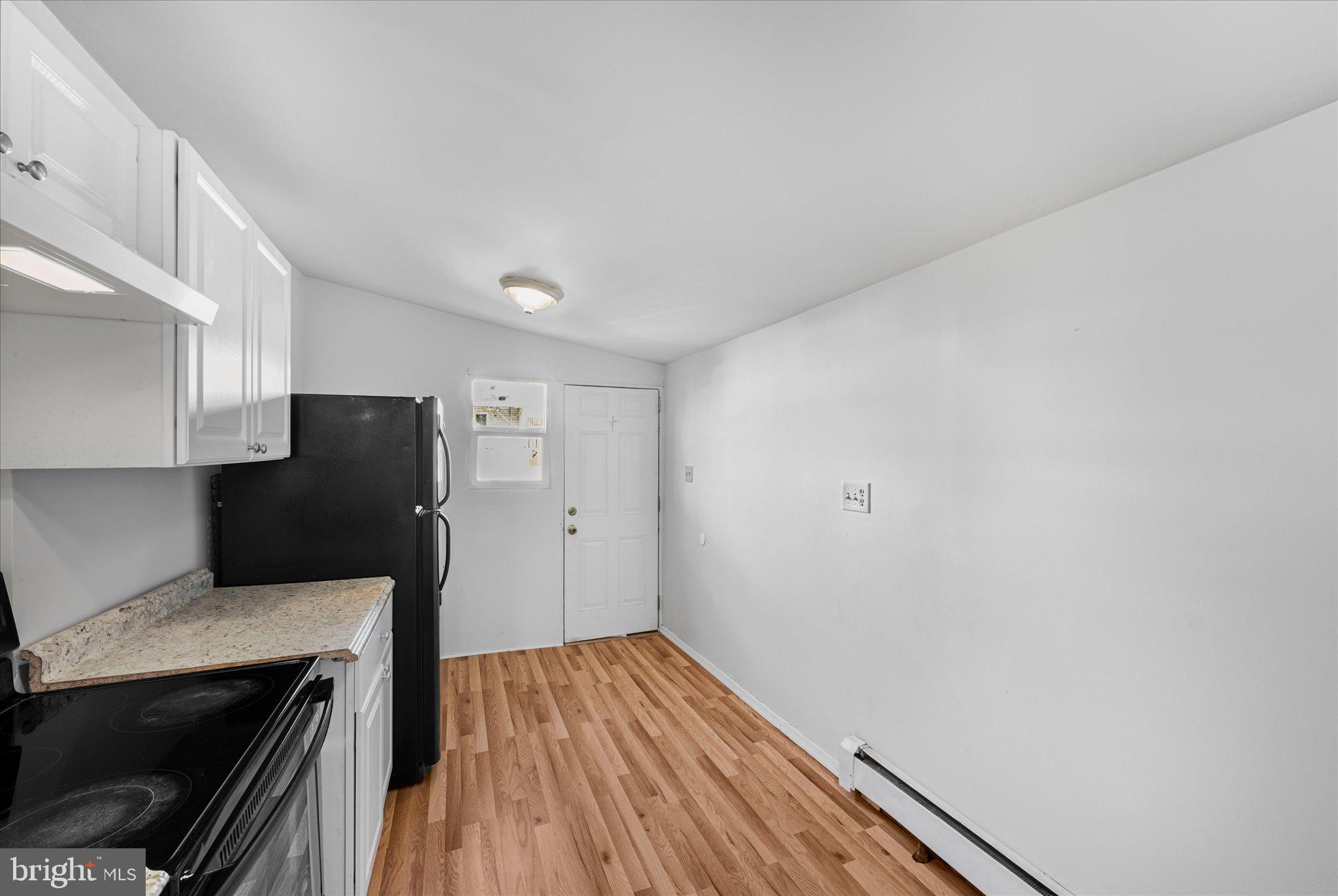1042 Locust Street Reading, PA 19604 - Photo 13 of 28 a view of kitchen and utility room