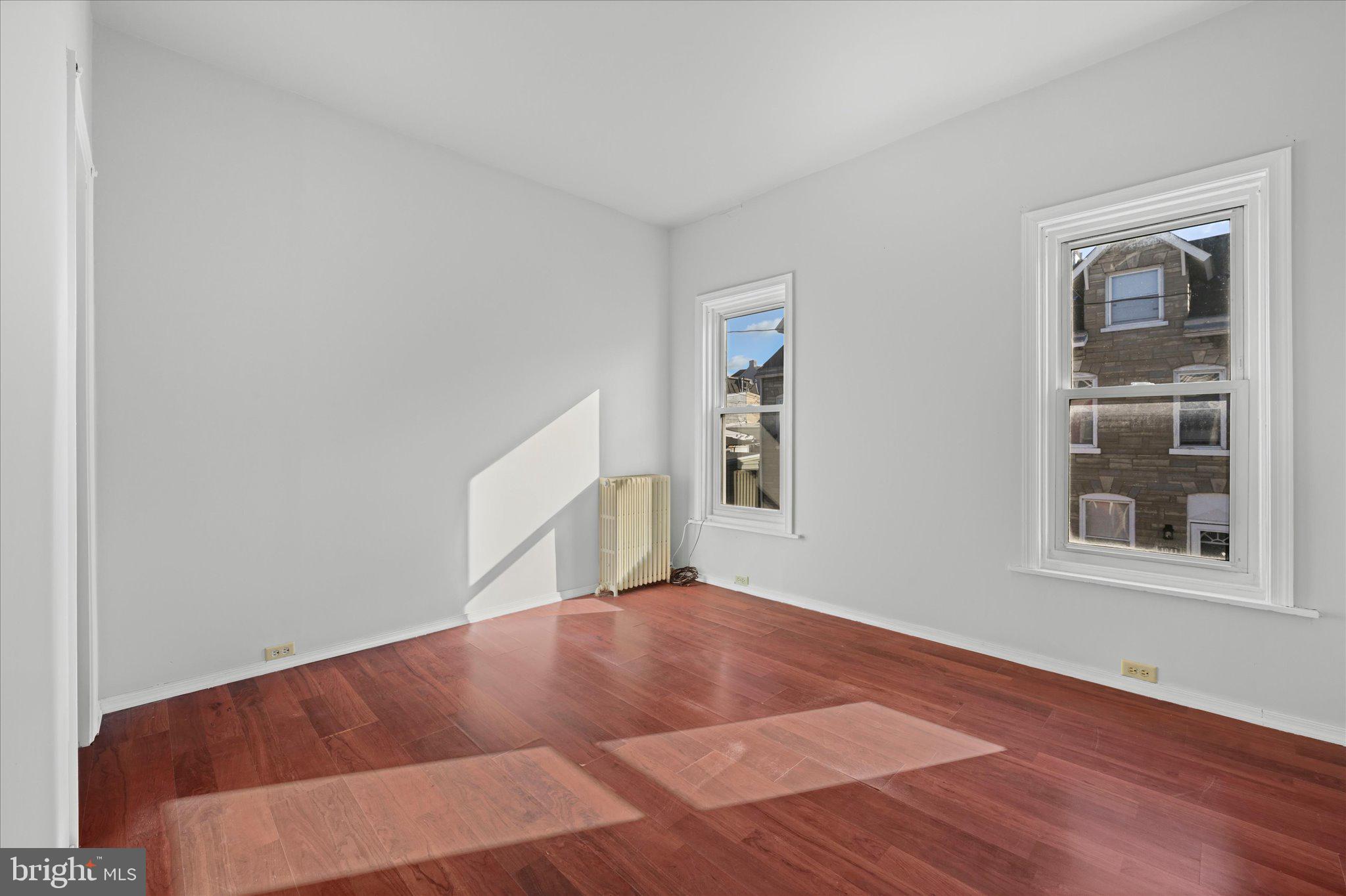 1042 Locust Street Reading, PA 19604 - Photo 15 of 28 an empty room with windows