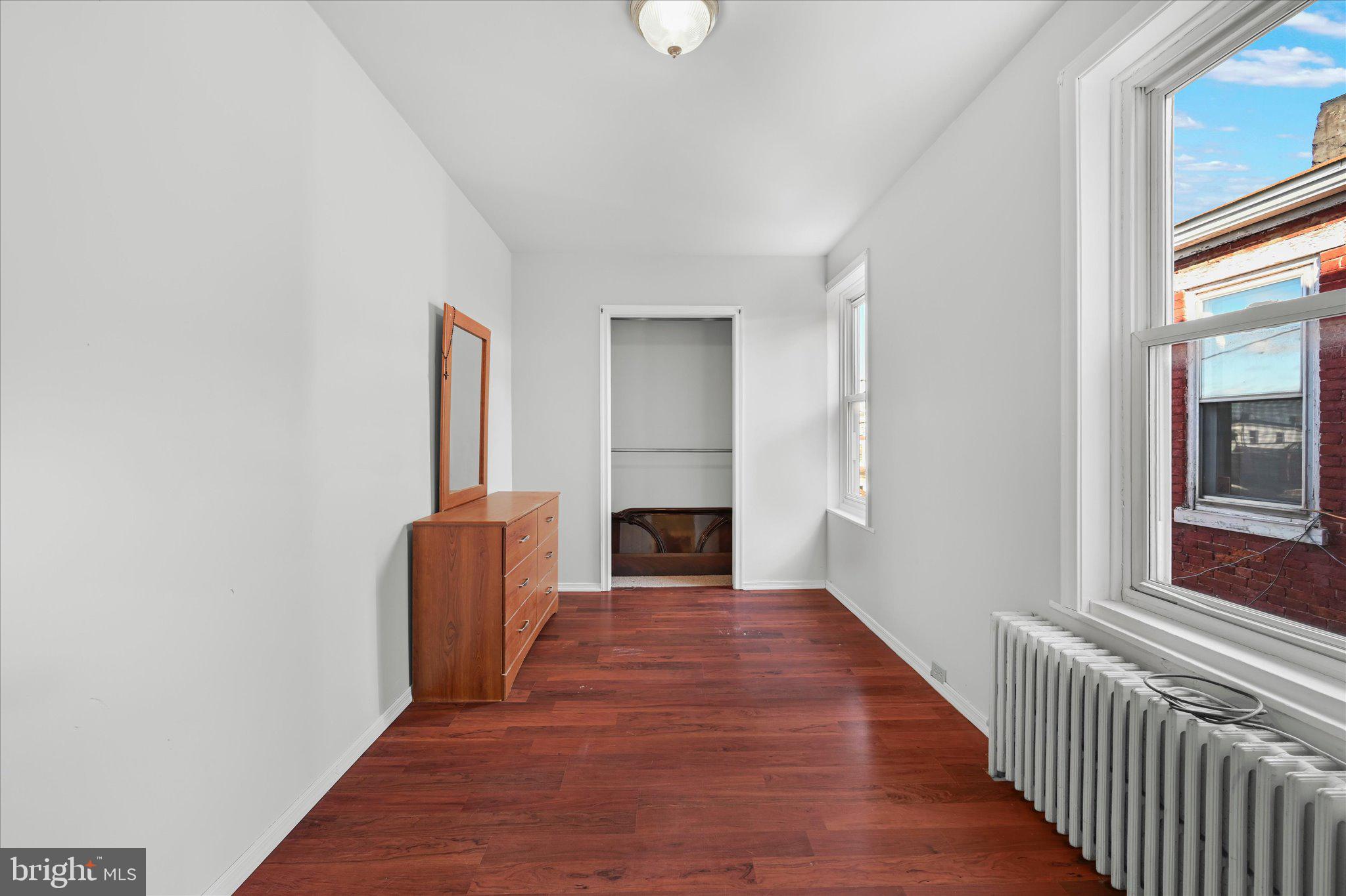 1042 Locust Street Reading, PA 19604 - Photo 18 of 28 a view of a livingroom with a fireplace and window